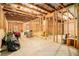Unfinished basement with exposed framing, offering ample space for customization and storage at 2031 Broadmoor Way, Fairburn, GA 30213