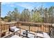 Relax on this cozy deck with stylish outdoor furniture, perfect for entertaining or enjoying quiet moments at 2031 Broadmoor Way, Fairburn, GA 30213