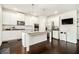 Kitchen with stainless steel appliances, granite countertops, and a central island at 2031 Broadmoor Way, Fairburn, GA 30213