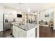 Open concept kitchen with granite countertops, stainless appliances and an island at 2031 Broadmoor Way, Fairburn, GA 30213