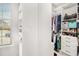 Well-organized walk-in closet with custom shelving and ample storage for clothes and accessories at 2031 Broadmoor Way, Fairburn, GA 30213