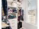 Organized closet space with shelves, drawers and rods for clothes at 2031 Broadmoor Way, Fairburn, GA 30213