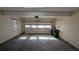 Spacious two-car garage with ample storage space and natural light at 545 Woodrow Dr, Lawrenceville, GA 30043