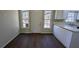 Kitchen area featuring plenty of natural light and outdoor access at 545 Woodrow Dr, Lawrenceville, GA 30043