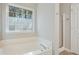Clean bathroom featuring a tub and a separate standing shower at 455 Registry Blf, Stone Mountain, GA 30087