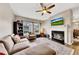 Inviting living room with a fireplace, hardwood floors, and stylish furnishings at 805 Vinings Forest Se Ln, Smyrna, GA 30080