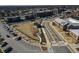 Aerial view of a well-planned community, highlighting streetscapes, parking areas, green spaces, and architectural styles at 133 Laurel Brook Ln, Canton, GA 30115