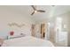 Bright bedroom with a bed, natural lighting and an attached bathroom at 1250 Rosette Way, Marietta, GA 30062