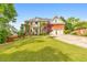 Beautiful two-story brick home with a well-manicured lawn and attached two-car garage at 1250 Rosette Way, Marietta, GA 30062