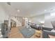Well-lit living room featuring recessed lighting, hardwood floors, and comfortable seating area, perfect for relaxation at 1250 Rosette Way, Marietta, GA 30062