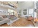 Spacious living room features soaring ceilings, hardwood floors, and a cozy fireplace at 1250 Rosette Way, Marietta, GA 30062