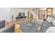 Bright and inviting living room with hardwood floors, a modern entertainment center, and comfortable seating arrangements at 1250 Rosette Way, Marietta, GA 30062