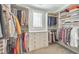 Spacious walk-in closet with custom shelving and ample storage for an organized wardrobe at 1250 Rosette Way, Marietta, GA 30062