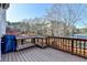 Back deck featuring a barbecue grill and preparation area, offering a great space for outdoor cooking and dining at 3986 Church View Ln, Suwanee, GA 30024