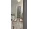 Clean and modern bathroom design with soaking tub, granite countertops and neutral tile at 4241 Summer Breeze Way, Buford, GA 30518