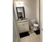 Bathroom with a granite countertop vanity, toilet, and tiled floors at 4241 Summer Breeze Way, Buford, GA 30518