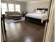 This bright bedroom has an expansive bed, seating and lots of light from many windows at 4241 Summer Breeze Way, Buford, GA 30518