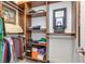 Organized walk-in closet with shelves, hanging rods, and ample storage space for clothes and accessories at 8095 Georgetown Cir, Suwanee, GA 30024