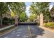Gated community entrance offering security and privacy for residents in this neighborhood at 8095 Georgetown Cir, Suwanee, GA 30024