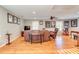 Spacious living room with hardwood floors, natural light, and comfortable seating at 8095 Georgetown Cir, Suwanee, GA 30024