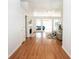 Bright, open living room featuring hardwood floors, a fireplace, and lots of natural light at 1970 Champions Pkwy, Lawrenceville, GA 30044