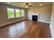 Bright living room with fireplace and large windows providing natural light at 223 Willow St, Canton, GA 30114