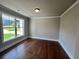 Cozy office space with hardwood floors and ample natural light at 223 Willow St, Canton, GA 30114