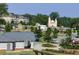 Neighborhood view with various residential buildings and a quaint church at 2474 Bayberry St # 33, Acworth, GA 30101