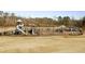 Playground equipment at the park, surrounded by open grass, perfect for recreation at 2474 Bayberry St # 33, Acworth, GA 30101