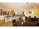 Bright and airy community clubhouse with a bar, seating, and dark wood billiard tables at 3635 E Paces Ne Cir # 1405, Atlanta, GA 30326