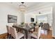 Bright dining room connected to the living room with hardwood floors at 3635 E Paces Ne Cir # 1405, Atlanta, GA 30326