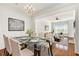 Bright dining room connected to the living room with hardwood floors at 3635 E Paces Ne Cir # 1405, Atlanta, GA 30326