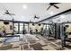 Fully equipped gym with modern exercise machines and large windows for a bright workout space at 3635 E Paces Ne Cir # 1405, Atlanta, GA 30326