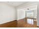 Open concept living room with hardwood floors, fireplace and modern ceiling fan at 3635 E Paces Ne Cir # 1405, Atlanta, GA 30326