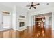 View of the open floor plan: living room with fireplace and an updated kitchen at 3635 E Paces Ne Cir # 1405, Atlanta, GA 30326