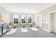 Bright building lobby with large windows, potted plants, and a seating area at 3635 E Paces Ne Cir # 1405, Atlanta, GA 30326