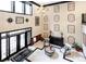 Grand lobby entrance with an ornate chandelier, decorative wall art, and comfortable seating at 3635 E Paces Ne Cir # 1405, Atlanta, GA 30326