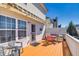 Cozy deck with painted floor, awning, and a dining set with chairs for outdoor dining at 4381 Prather Son Dr, Loganville, GA 30052
