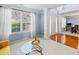 Bright and airy living room with large windows, a modern coffee table, and comfortable seating at 4381 Prather Son Dr, Loganville, GA 30052