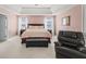 Tranquil main bedroom suite with trey ceilings, natural light, and relaxing ambiance at 4381 Prather Son Dr, Loganville, GA 30052
