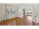 Bright living room with hardwood floors, fireplace, and natural light at 460 High Pointe Trl, Roswell, GA 30076