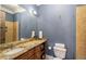 Comfortable bathroom with granite countertop, tile floors and backsplash, and recessed lighting at 1207 Thornwell Ne Dr, Brookhaven, GA 30319
