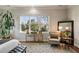Serene bedroom showcasing a large window and comfortable seating area at 1207 Thornwell Ne Dr, Brookhaven, GA 30319
