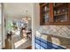 Stylish dining room featuring built-in cabinets and abundant natural light from a large window at 1207 Thornwell Ne Dr, Brookhaven, GA 30319