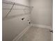 Practical laundry room with tiled floors, shelving, and utility hookups at 219 Willow St, Canton, GA 30114