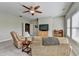 Upstairs bonus room with seating, TV and lots of natural light at 3905 Alister Park Dr, Cumming, GA 30040