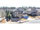 Well-maintained home with a two-car garage, landscaping, and a spacious front lawn at 3905 Alister Park Dr, Cumming, GA 30040