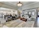Open-concept living space with a seamless transition to the kitchen, perfect for modern living and entertaining at 3905 Alister Park Dr, Cumming, GA 30040