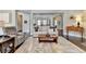 Inviting living room featuring hardwood floors, a comfortable sofa, and decorative elements for a stylish touch at 3905 Alister Park Dr, Cumming, GA 30040