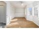 Bright bedroom with a ceiling fan, carpet floors and double windows with a view at 436 Avery St, Decatur, GA 30030